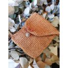 Óarany fényes fonalból horgolt tasak,raku kerámia gombbal